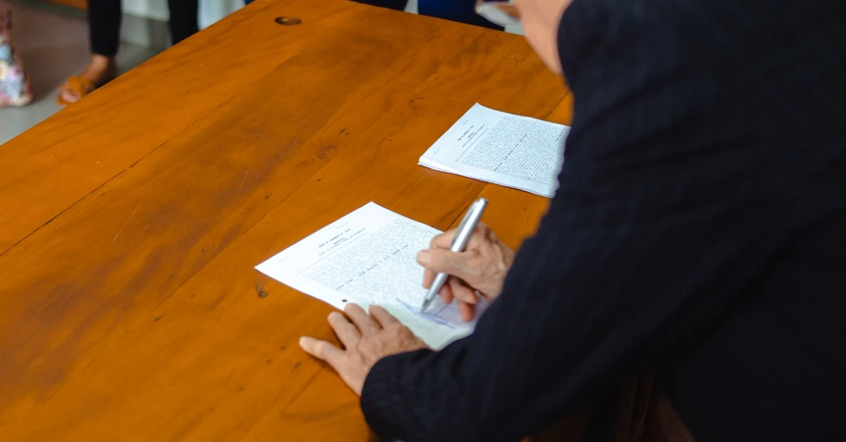 Signing supplier contract documents and audit rights for compostable product compliance.