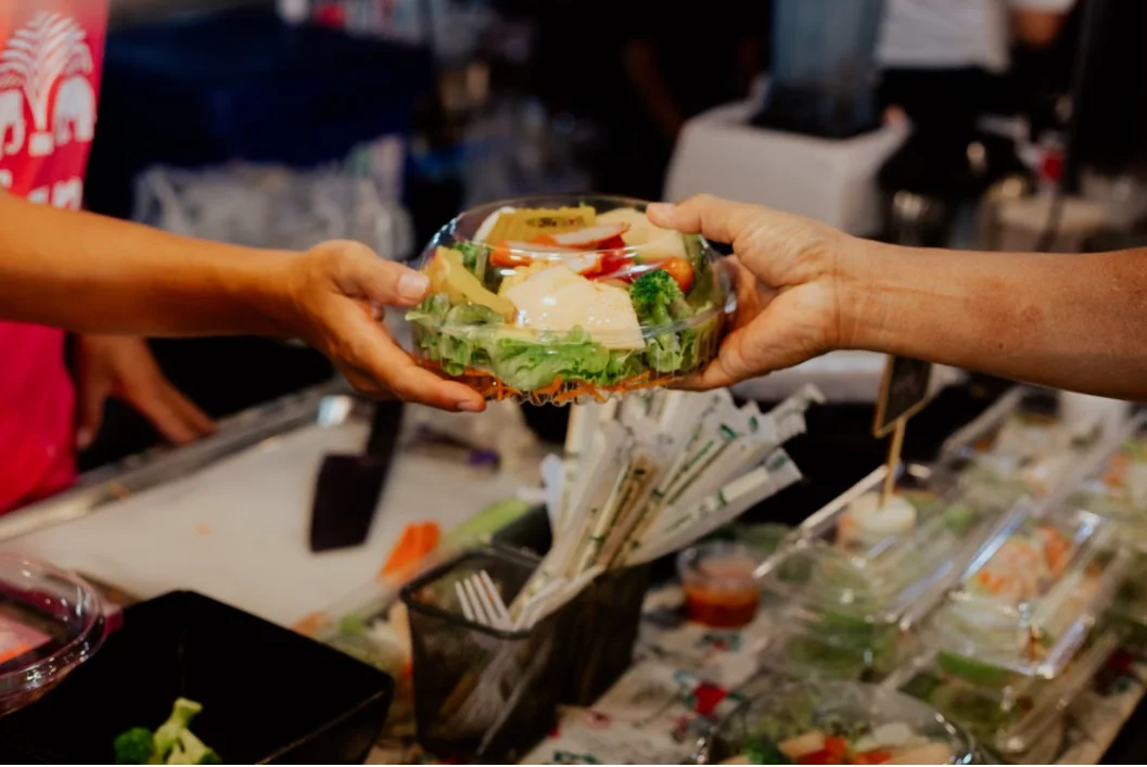 Compostable packaging and food container exchange illustrating supplier vetting for greenwashing claims.